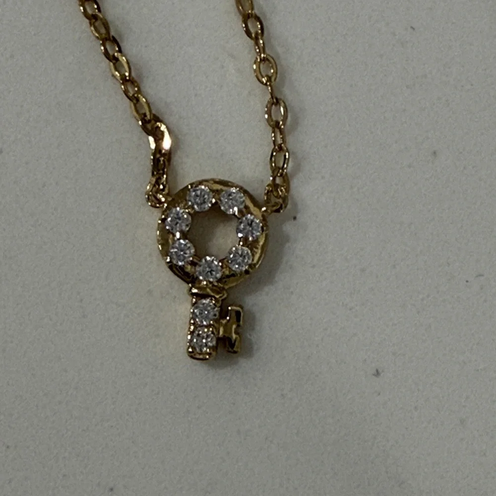 (26)Nadri NEW CZ Key to my heart necklace